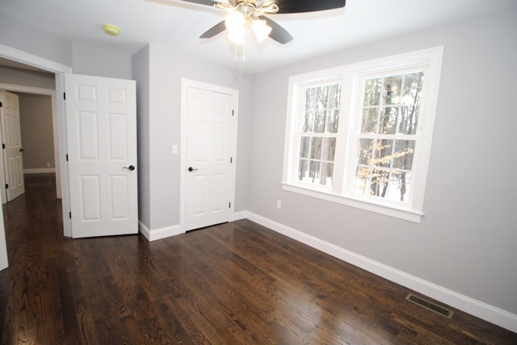 79 Dudley Road Templeton, MA 01468 - Photo 14 of 40 wooden floor in an empty room with a window