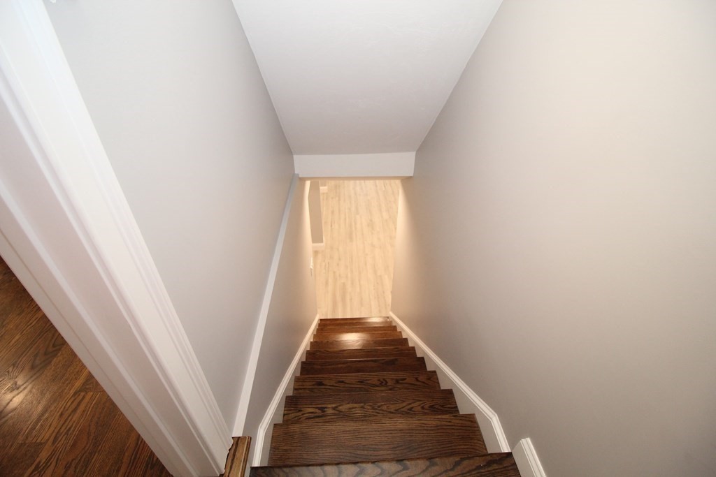 79 Dudley Road Templeton, MA 01468 - Photo 26 of 40 a view of a hallway with a window