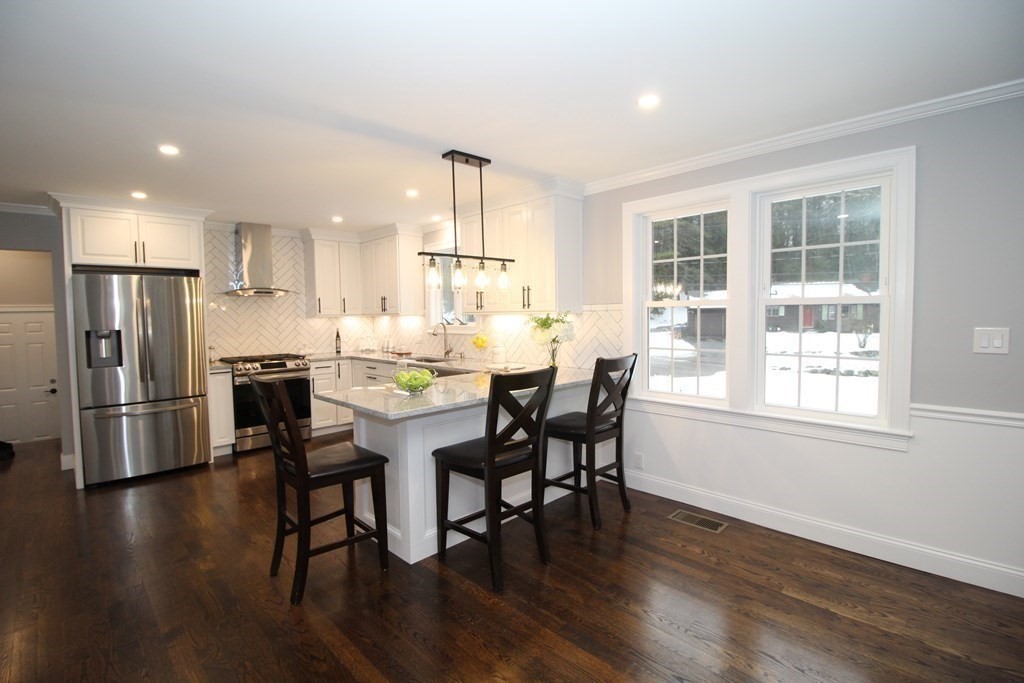 79 Dudley Road Templeton, MA 01468 - Photo 36 of 40 a view of a dining room with furniture and wooden floor