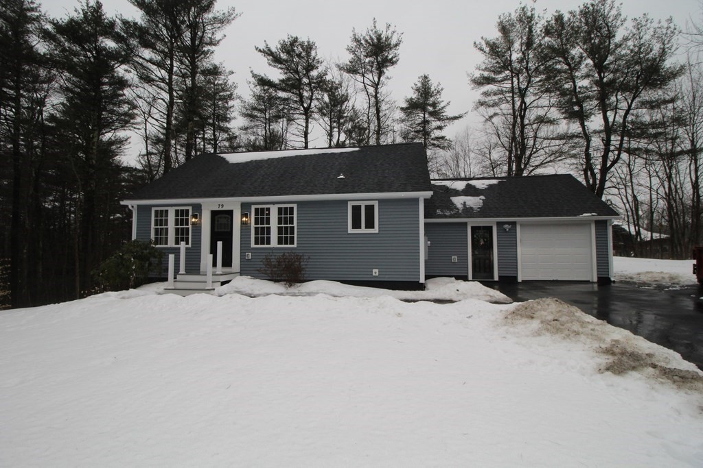 79 Dudley Road Templeton, MA 01468 - Photo 40 of 40 a front view of a house with a yard covered in snow