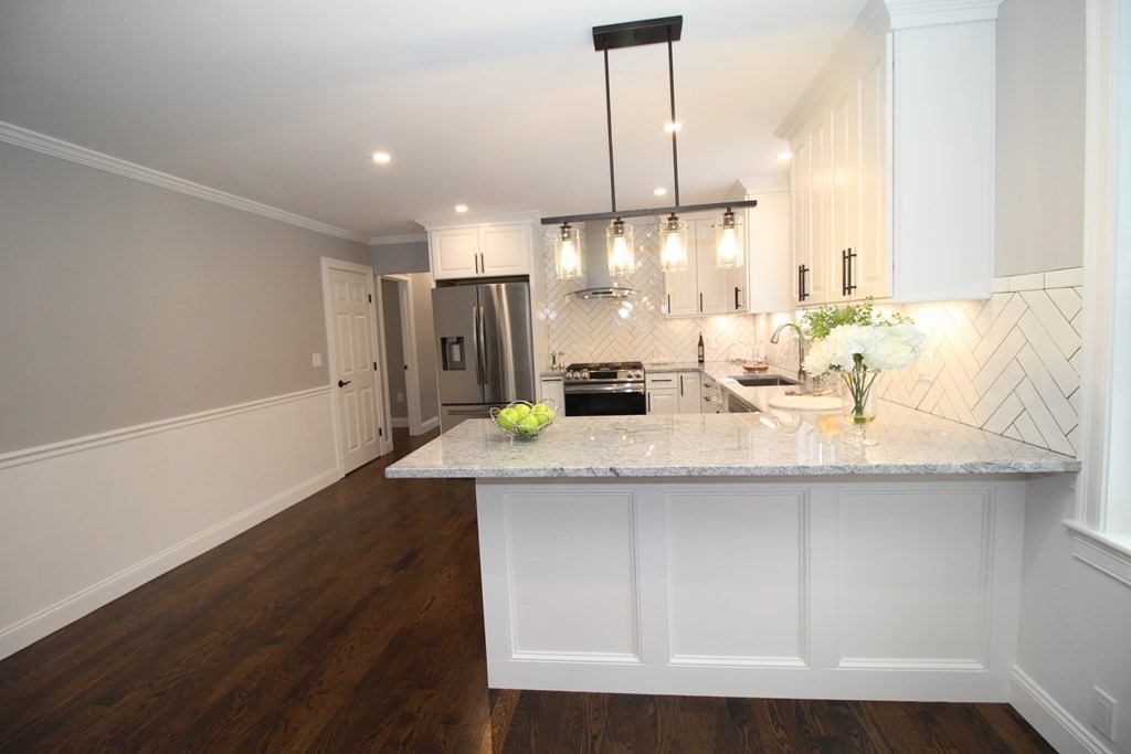 79 Dudley Road Templeton, MA 01468 - Photo 6 of 40 a kitchen with a sink a counter space and cabinets
