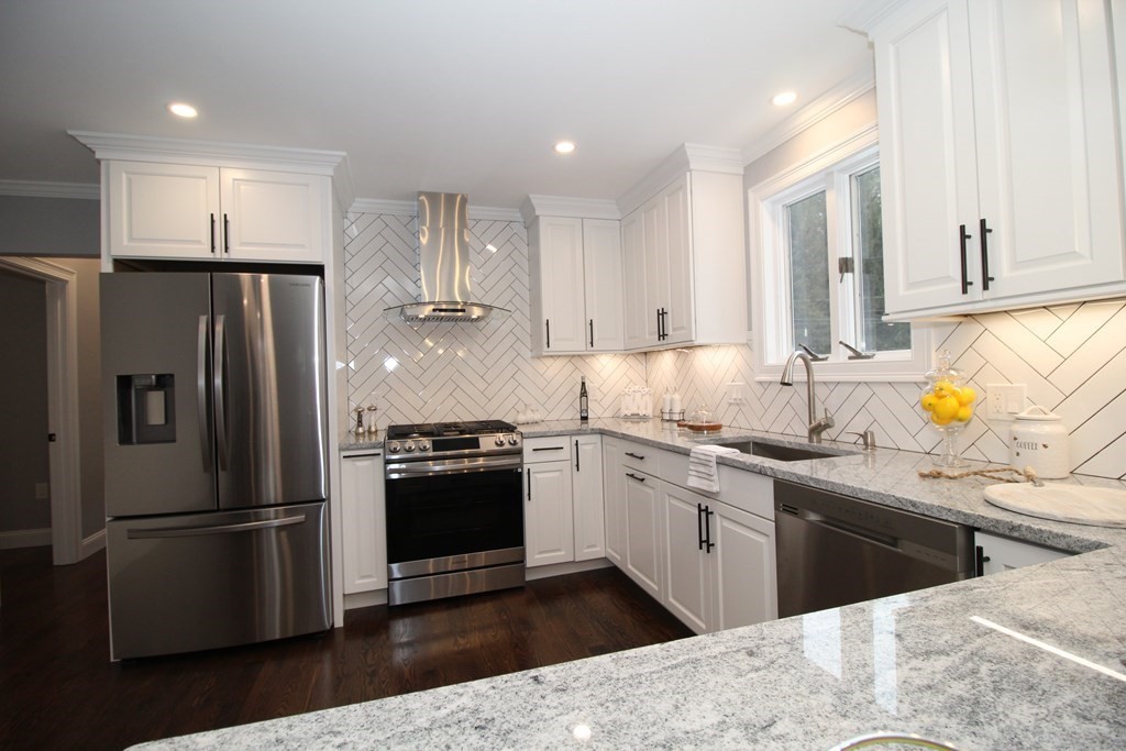 79 Dudley Road Templeton, MA 01468 - Photo 7 of 40 a kitchen with stainless steel appliances granite countertop a sink stove and refrigerator