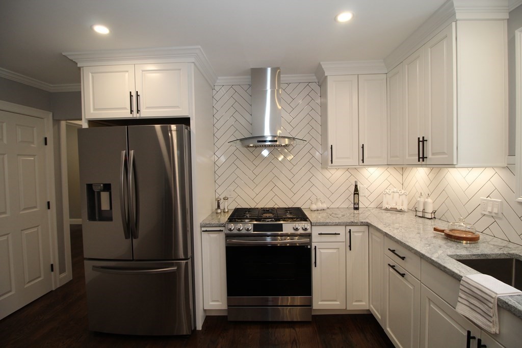 79 Dudley Road Templeton, MA 01468 - Photo 9 of 40 a kitchen with stainless steel appliances granite countertop a refrigerator and a stove