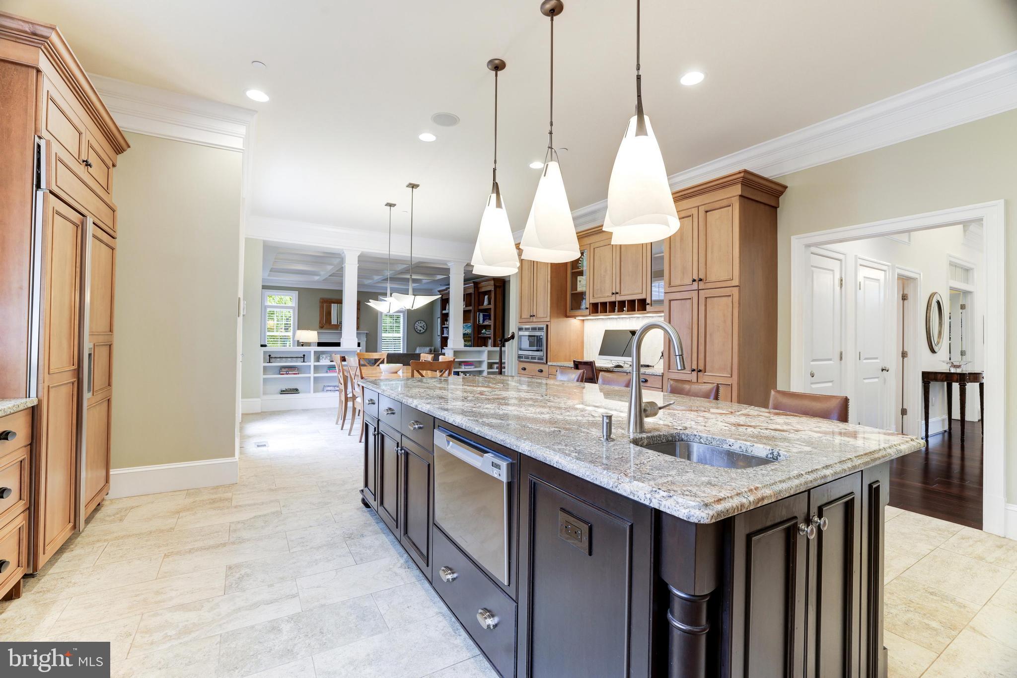 6502 Quaker Ridge Road North Bethesda, MD 20852 - Photo 20 of 60 The island has a prep sink and a dishwasher drawer