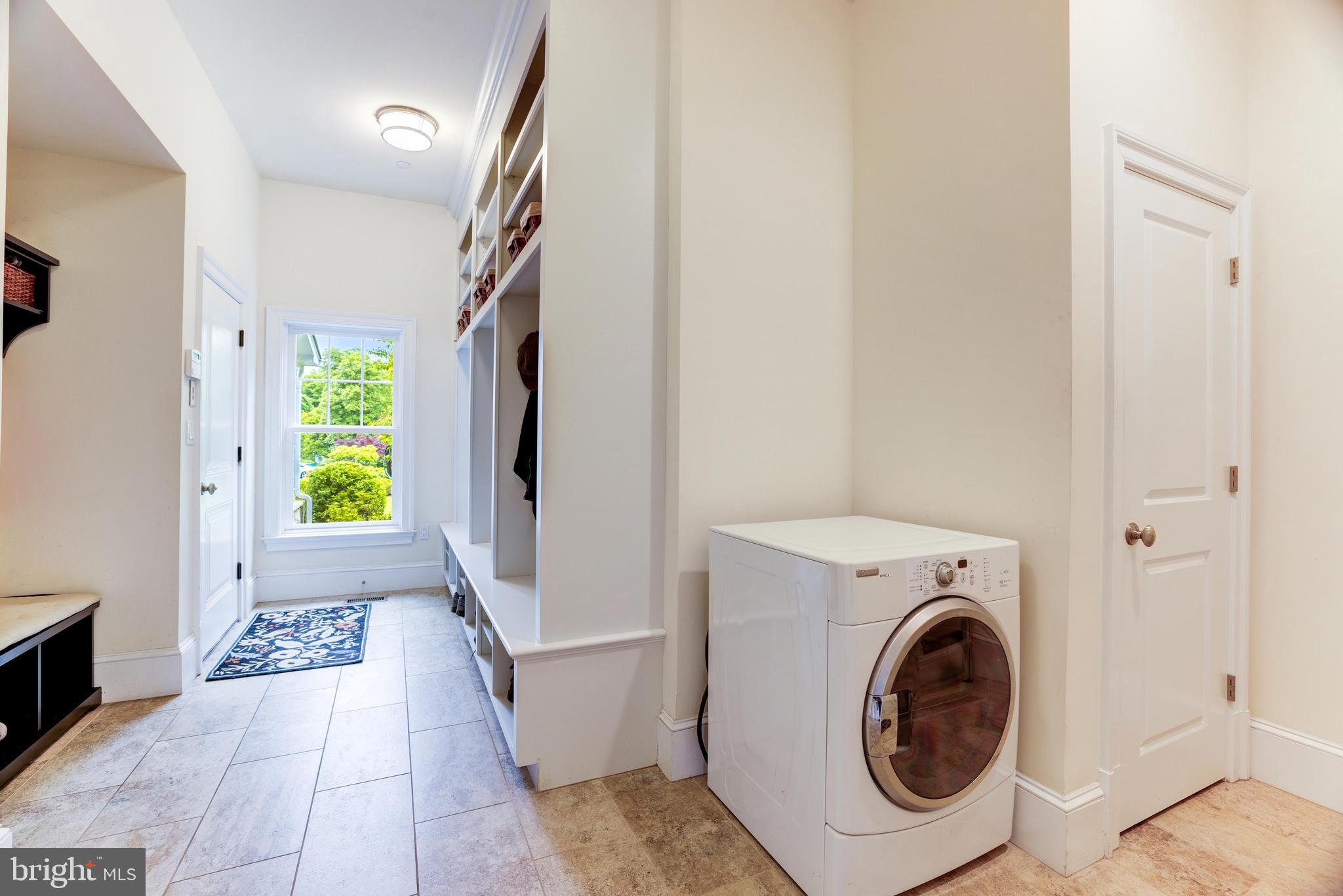 6502 Quaker Ridge Road North Bethesda, MD 20852 - Photo 28 of 60 Back inside, the mudroom has cubbies AND closets!