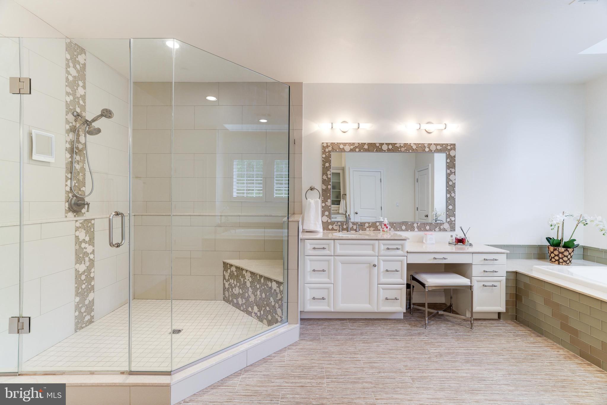 6502 Quaker Ridge Road North Bethesda, MD 20852 - Photo 34 of 60 With a glass enclosed shower and separate vanities