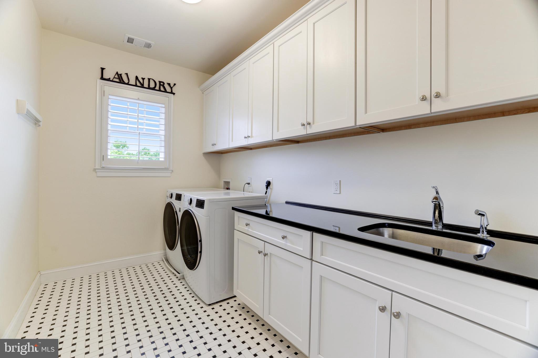 6502 Quaker Ridge Road North Bethesda, MD 20852 - Photo 36 of 60 Next, the upstairs laundry room!