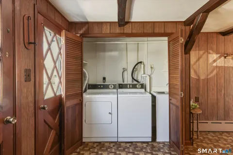 a view of a door and wooden floor
