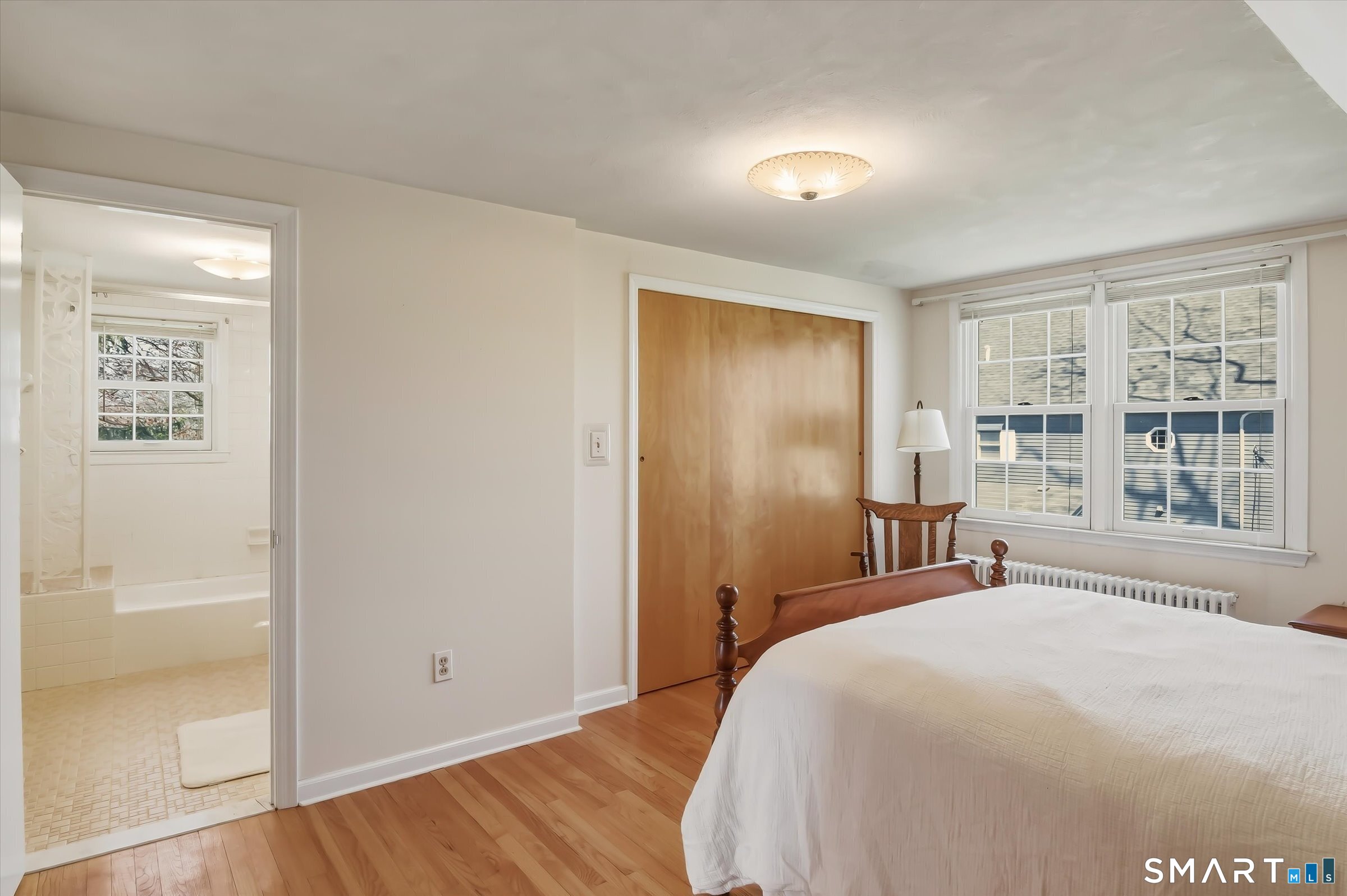 204 Branford Road North Branford, CT 06471 - Photo 25 of 39 a bedroom with a large bed and a window