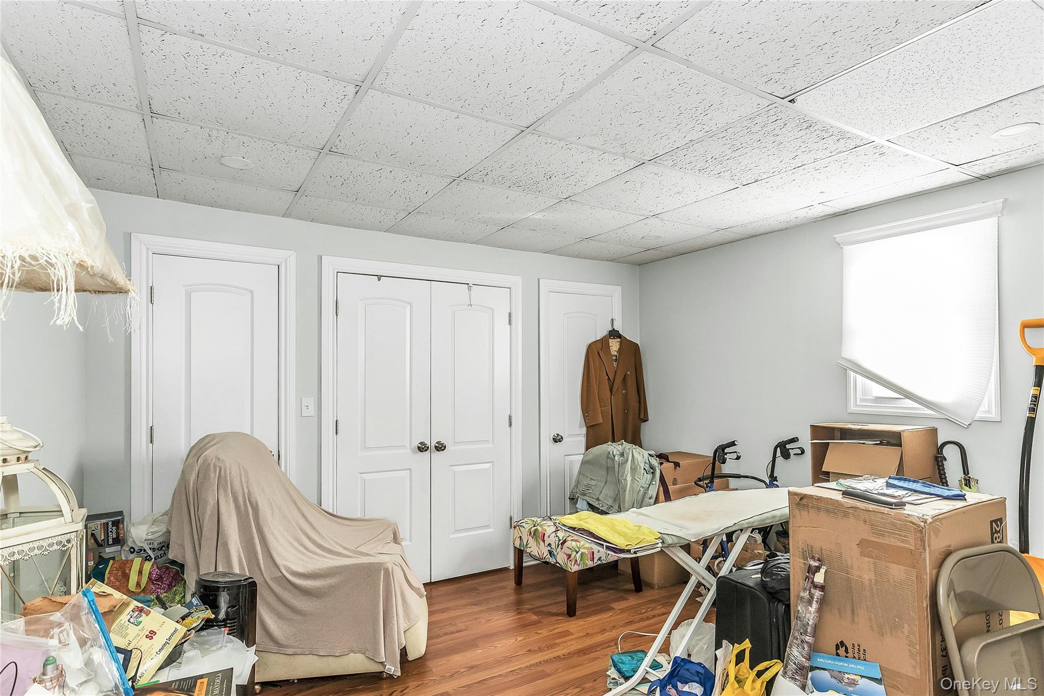 622 Wellelein Road Uniondale, NY 11553 - Photo 8 of 18 Additional Bedroom with large two door closet and backyard entrance