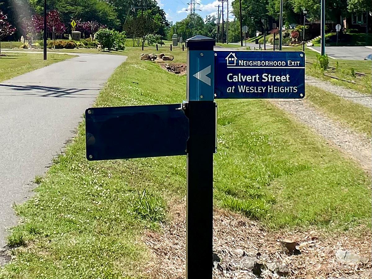 630 Calvert Street, Unit 1110 Charlotte, NC 28208 - Photo 4 of 28 a view of a sign board with yard