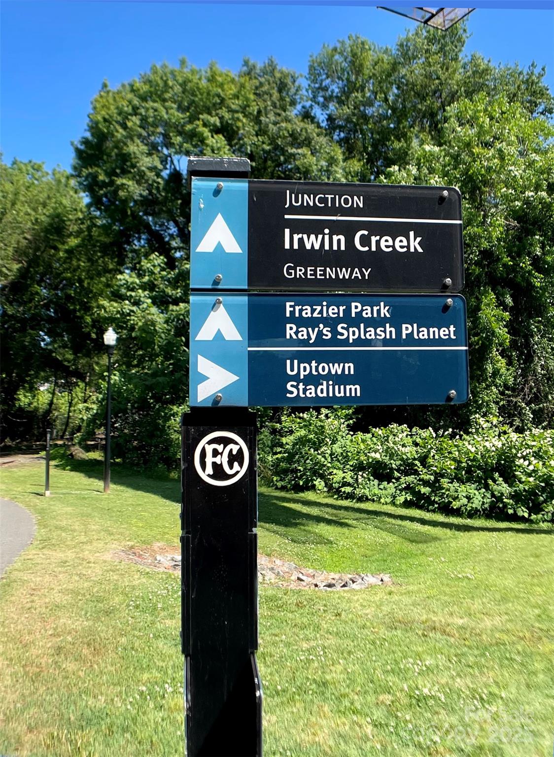 630 Calvert Street, Unit 1110 Charlotte, NC 28208 - Photo 5 of 28 a sign on the side of a building