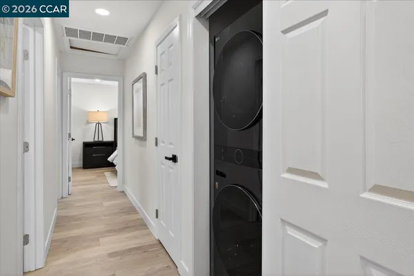 a view of a bathroom from the hallway