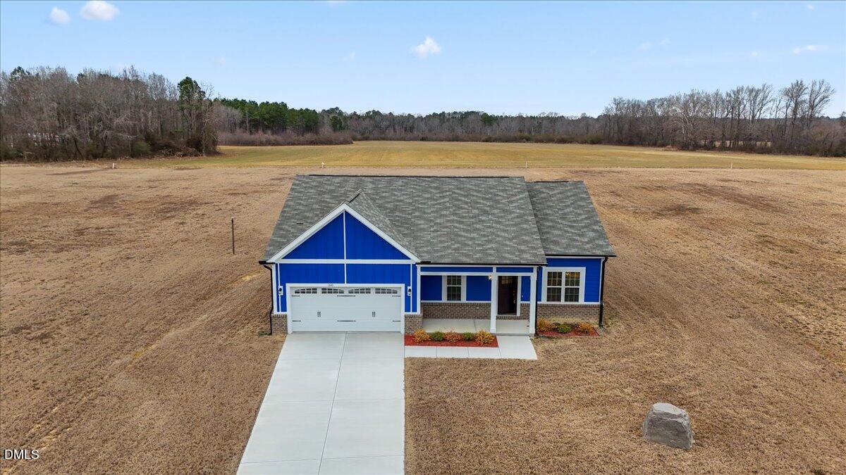 1300 Nick Coley Road Whitakers, NC 27891 - Photo 43 of 47 a house with river in front of it