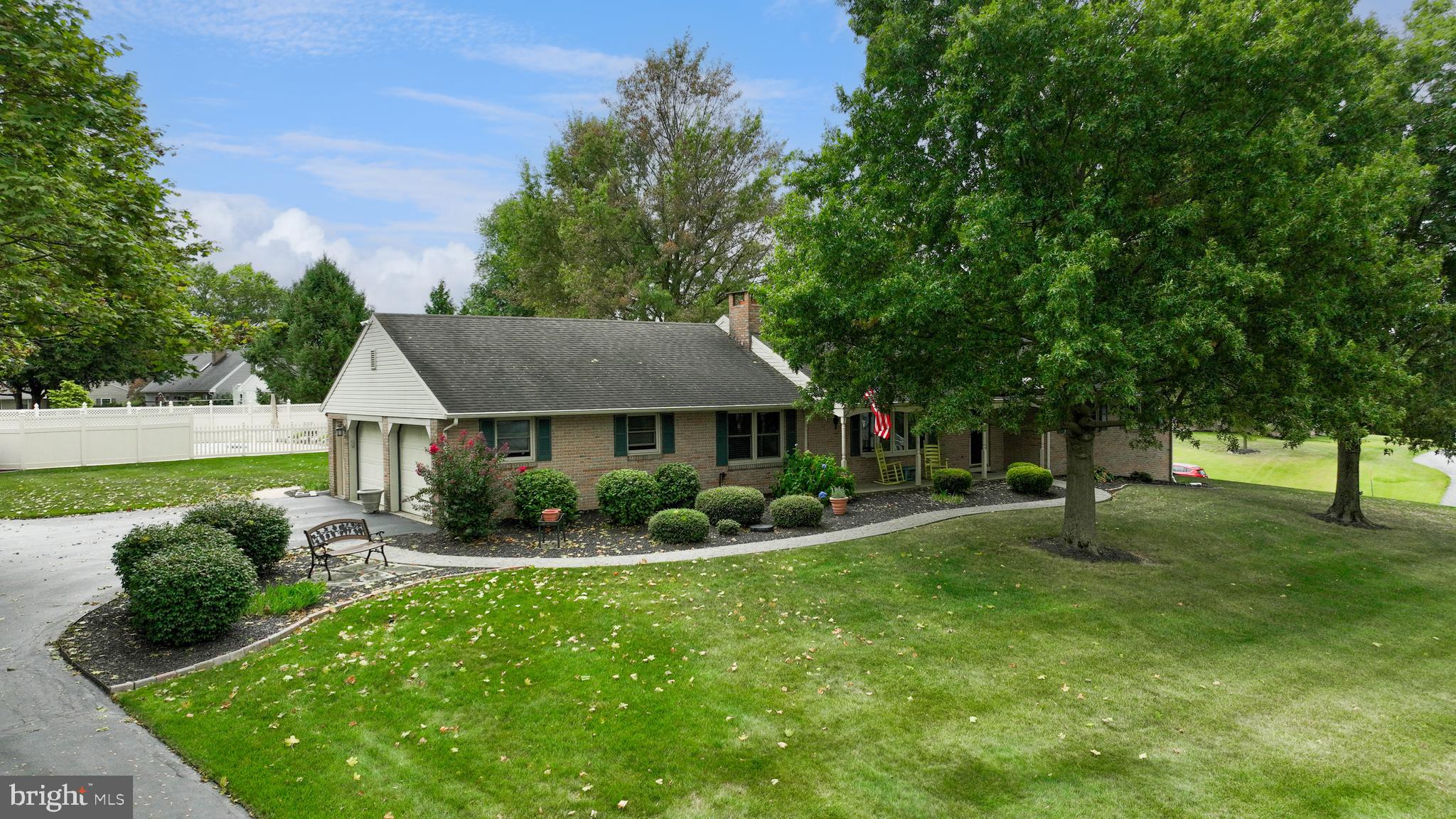 310 West Lexington Road Lititz, PA 17543 - Photo 1 of 58 a front view of a house with a yard