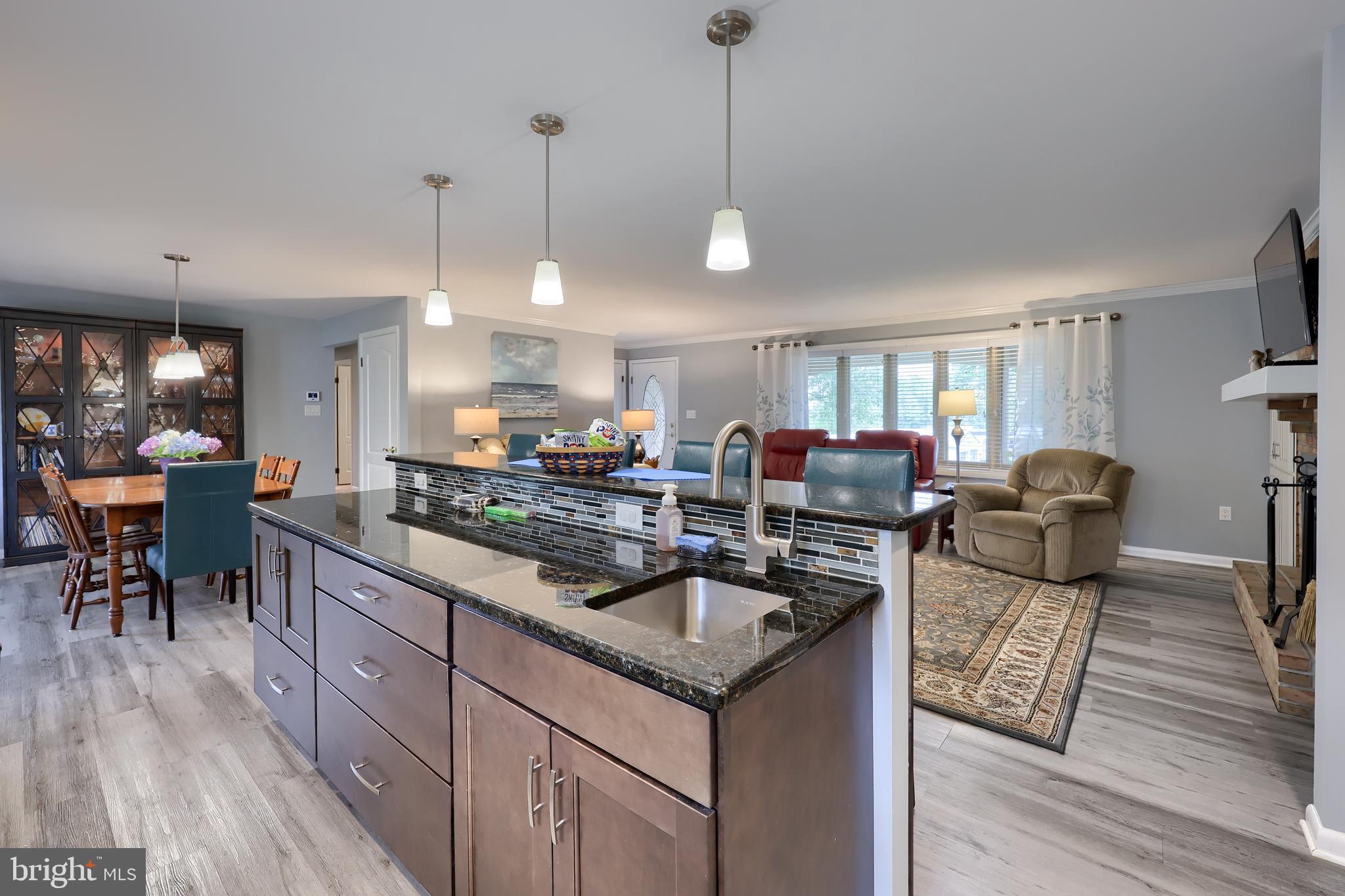 310 West Lexington Road Lititz, PA 17543 - Photo 11 of 58 a kitchen with sink stove and wooden floor