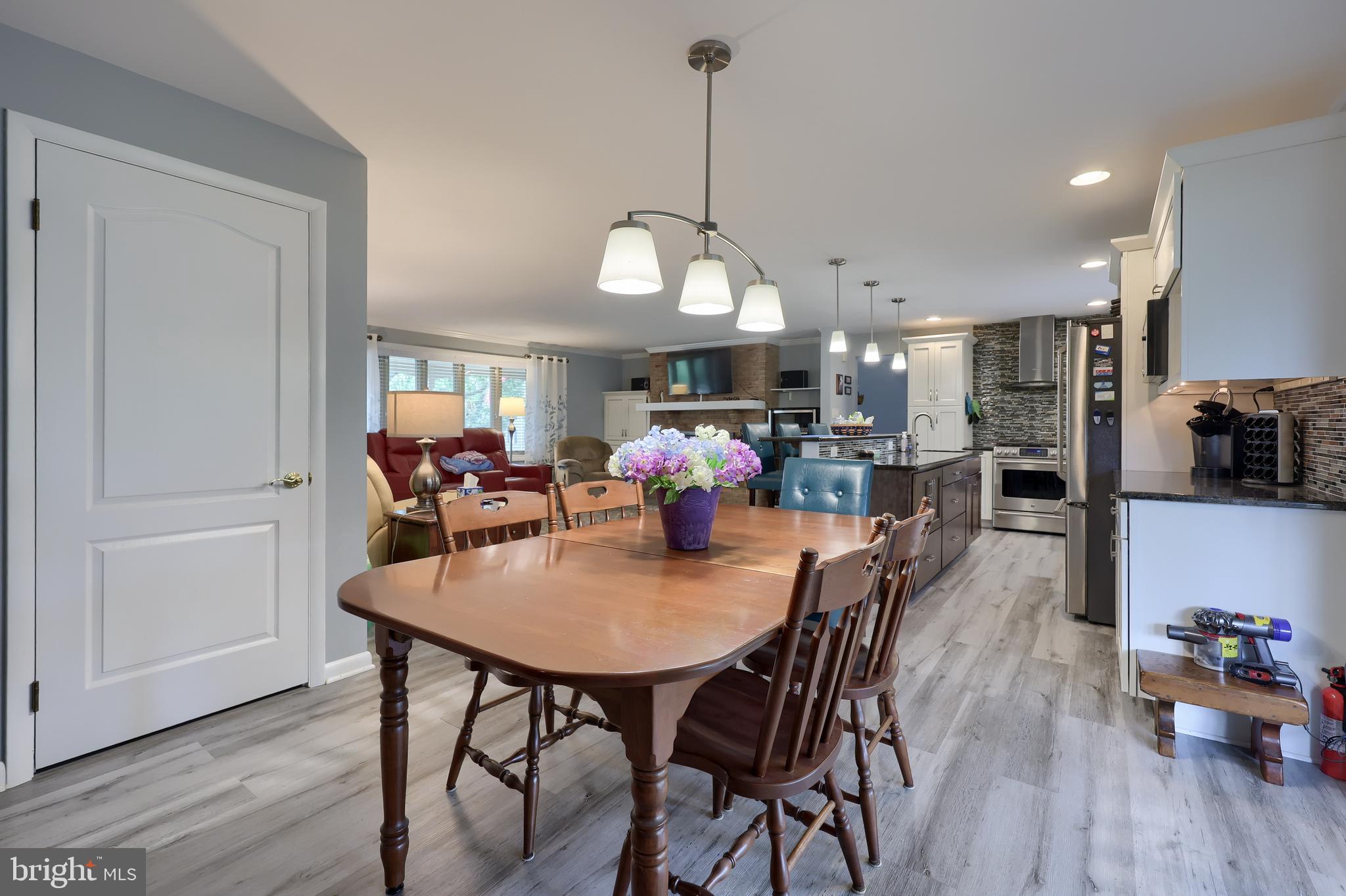 310 West Lexington Road Lititz, PA 17543 - Photo 17 of 58 a dining room filled with furniture and wooden floor