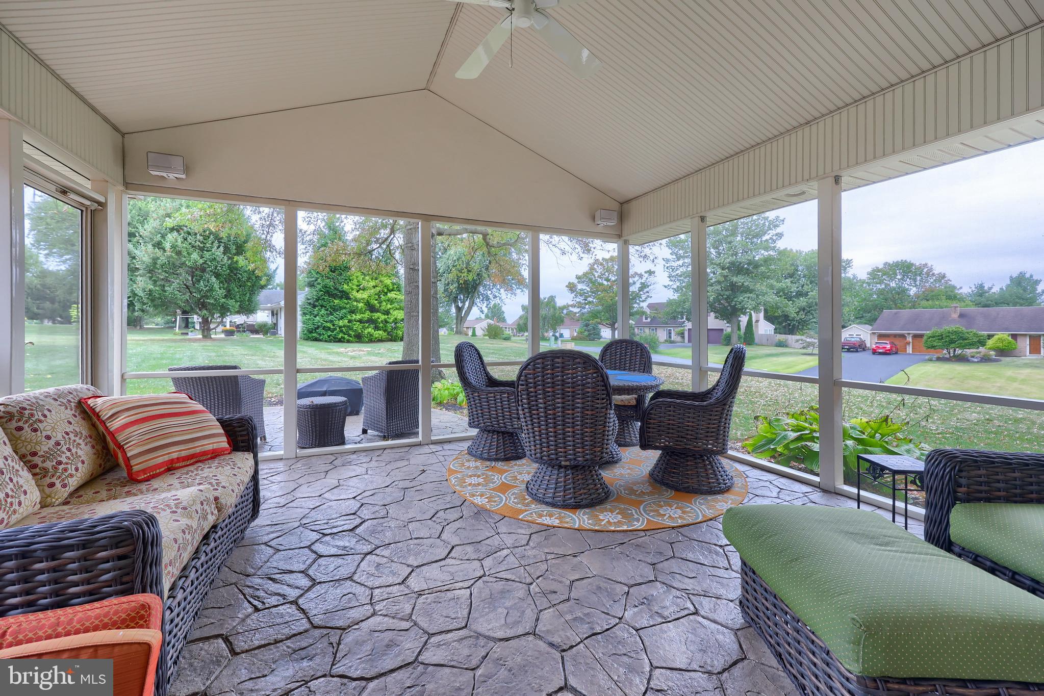 310 West Lexington Road Lititz, PA 17543 - Photo 34 of 58 a living room with patio furniture and a floor to ceiling window