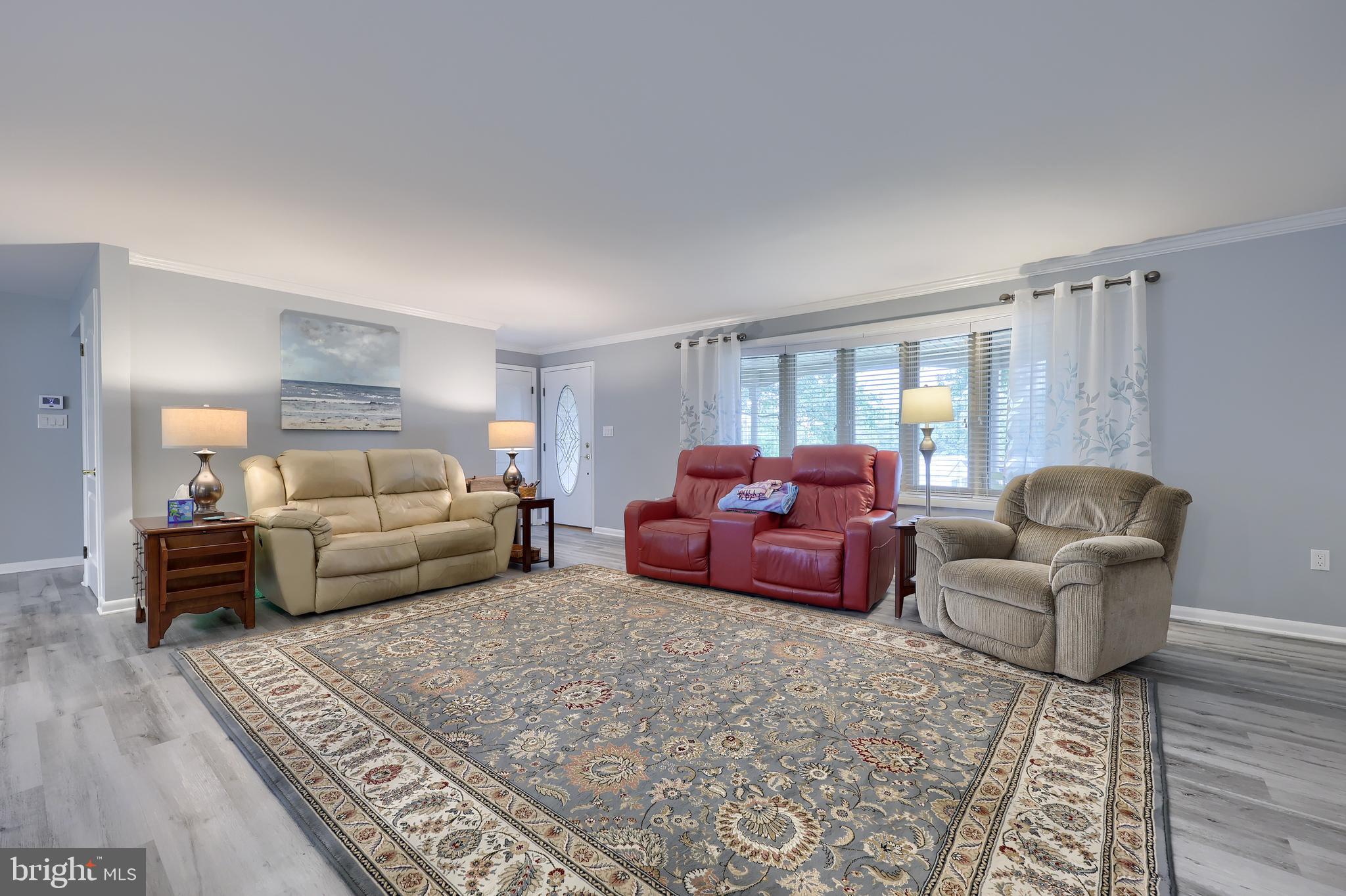 310 West Lexington Road Lititz, PA 17543 - Photo 5 of 58 a bedroom with furniture and wooden floor