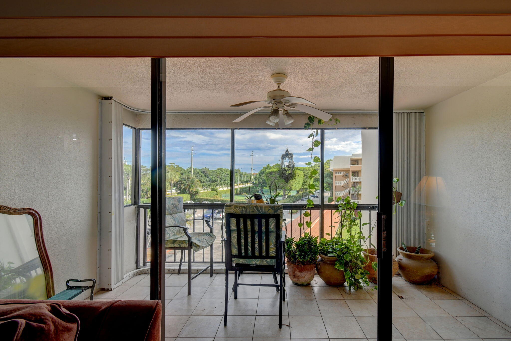300 Golfview Road, Unit 407 North Palm Beach, FL 33408 - Photo 14 of 56 a room with furniture and a window