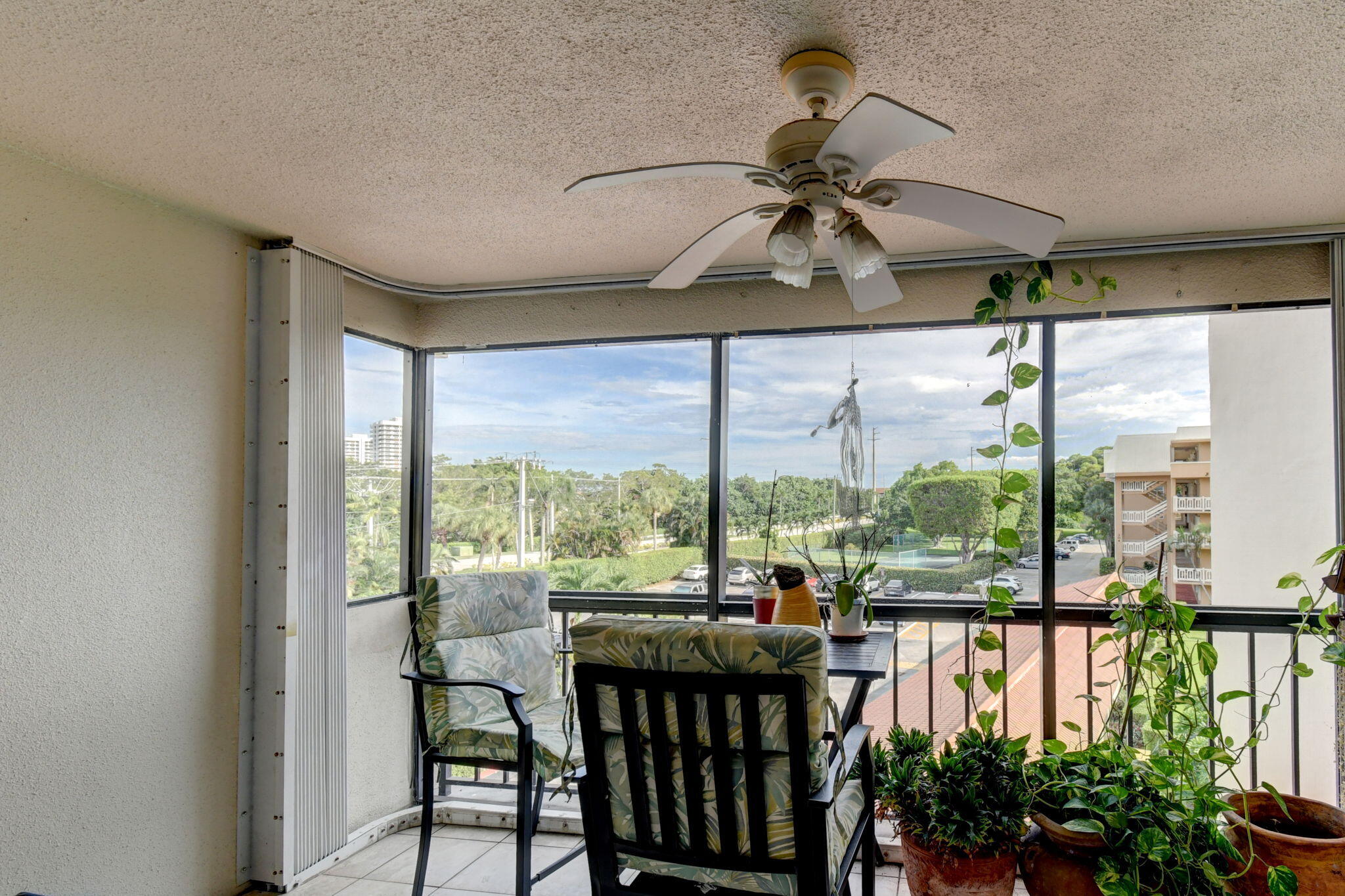 300 Golfview Road, Unit 407 North Palm Beach, FL 33408 - Photo 15 of 56 a view of a dining room with furniture window and outside view