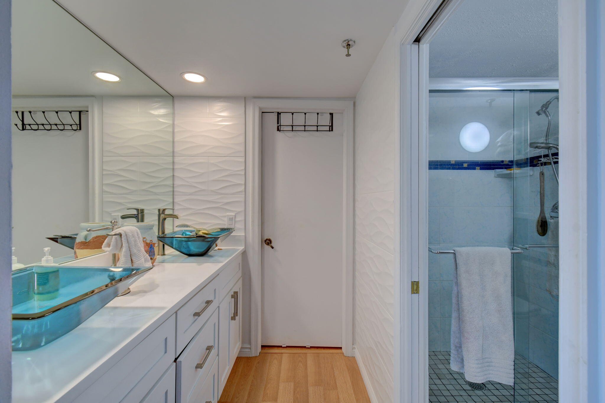 300 Golfview Road, Unit 407 North Palm Beach, FL 33408 - Photo 23 of 56 a kitchen with stainless steel appliances granite countertop a refrigerator and a sink