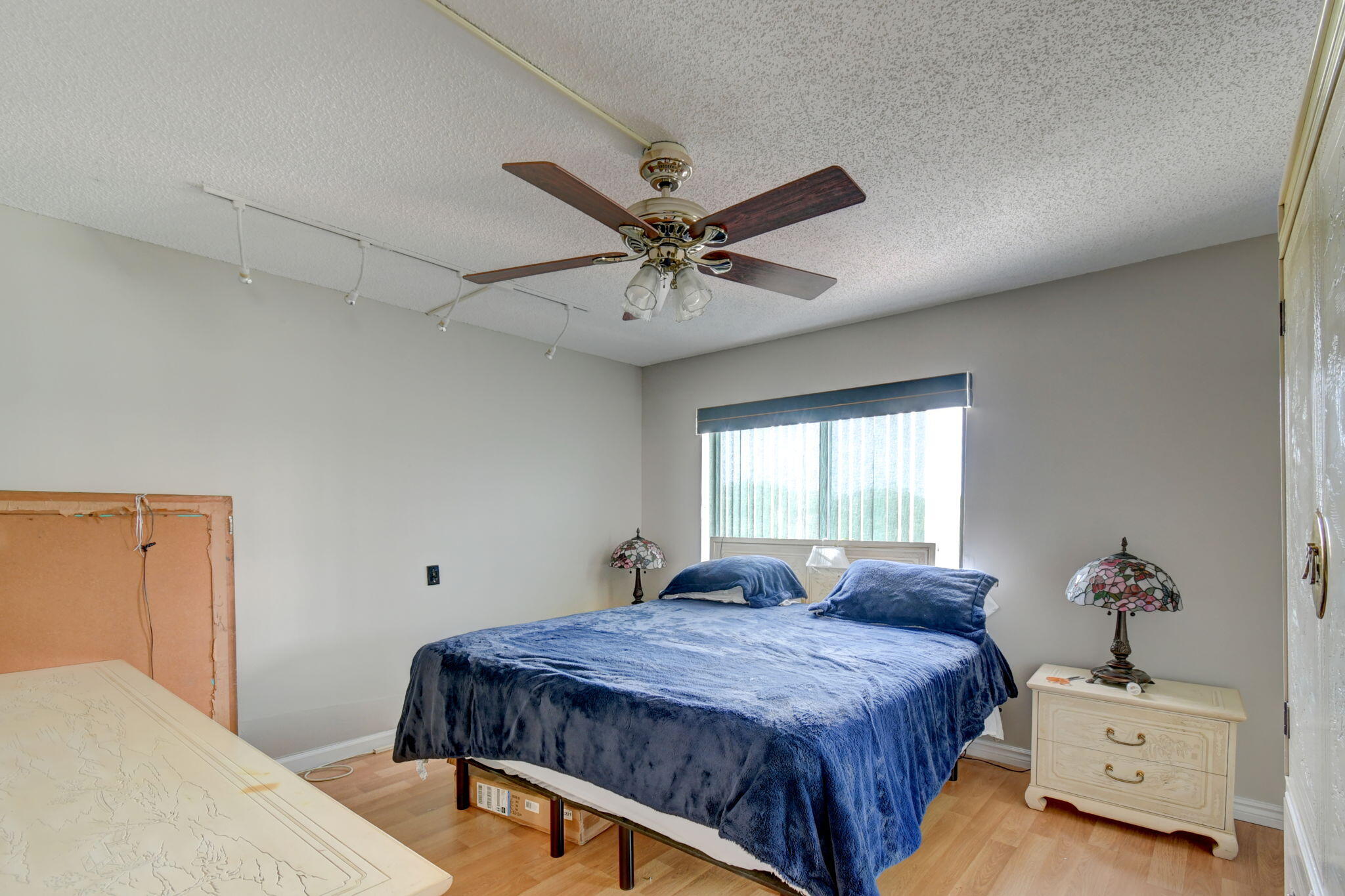 300 Golfview Road, Unit 407 North Palm Beach, FL 33408 - Photo 24 of 56 a bedroom with a bed and window