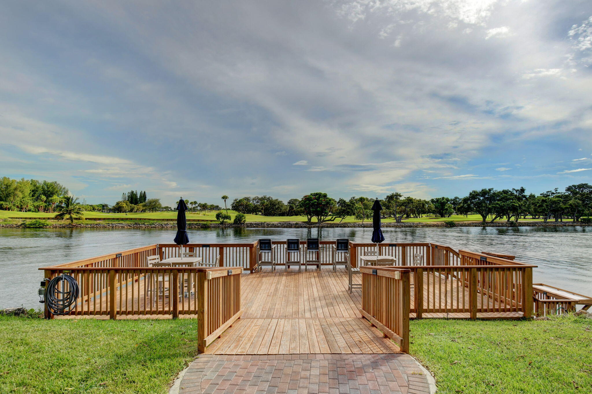 300 Golfview Road, Unit 407 North Palm Beach, FL 33408 - Photo 27 of 56 a view of a lake with a garden