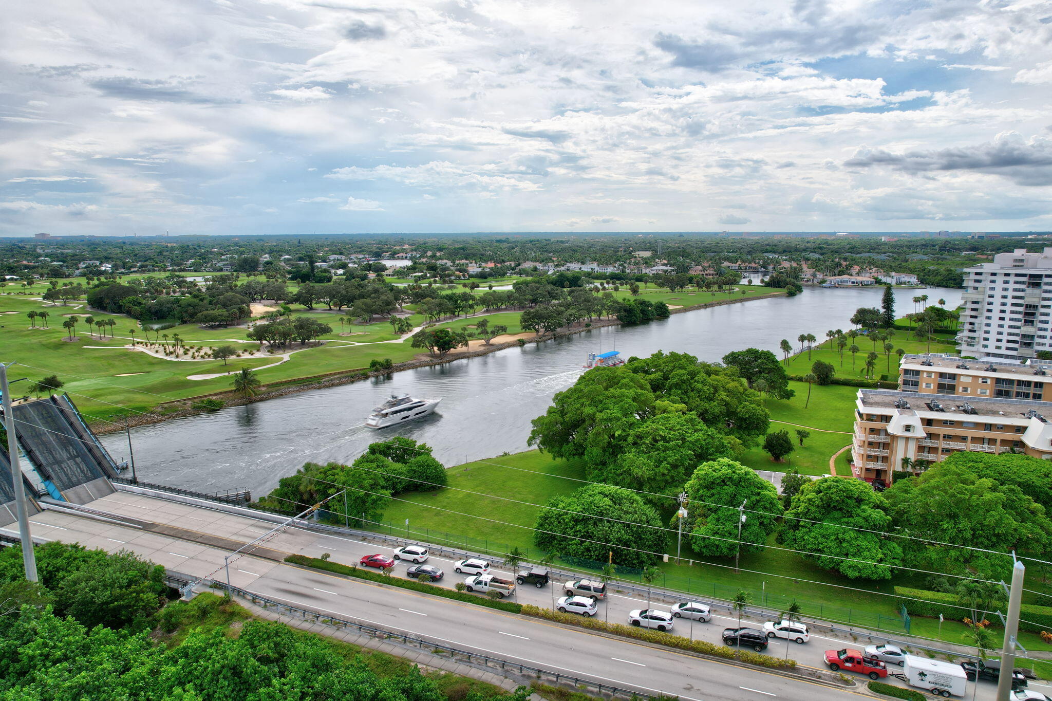 300 Golfview Road, Unit 407 North Palm Beach, FL 33408 - Photo 38 of 56 an aerial view of a house with a garden and lake view