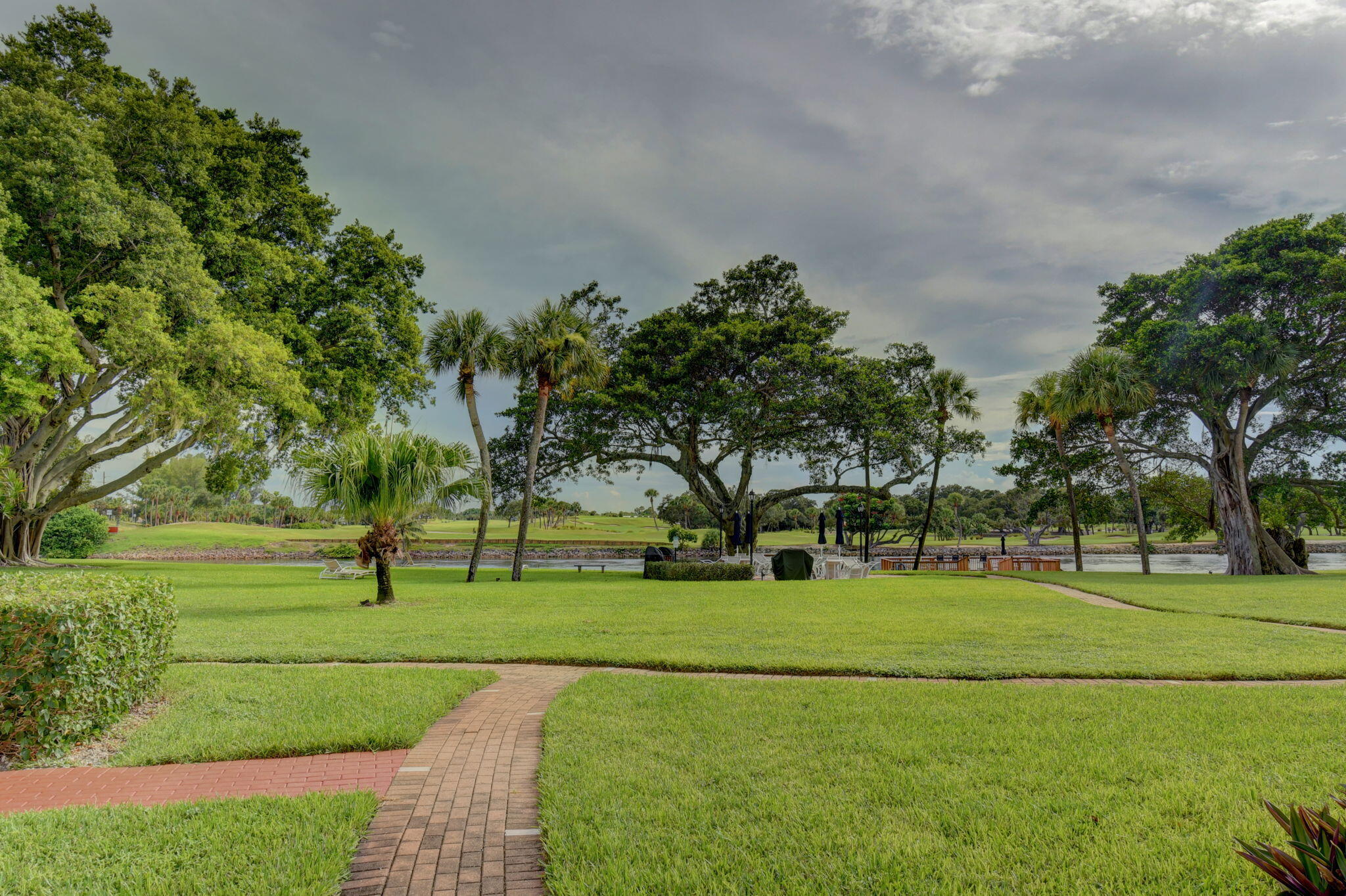 300 Golfview Road, Unit 407 North Palm Beach, FL 33408 - Photo 46 of 56 a park with lots of trees and plants