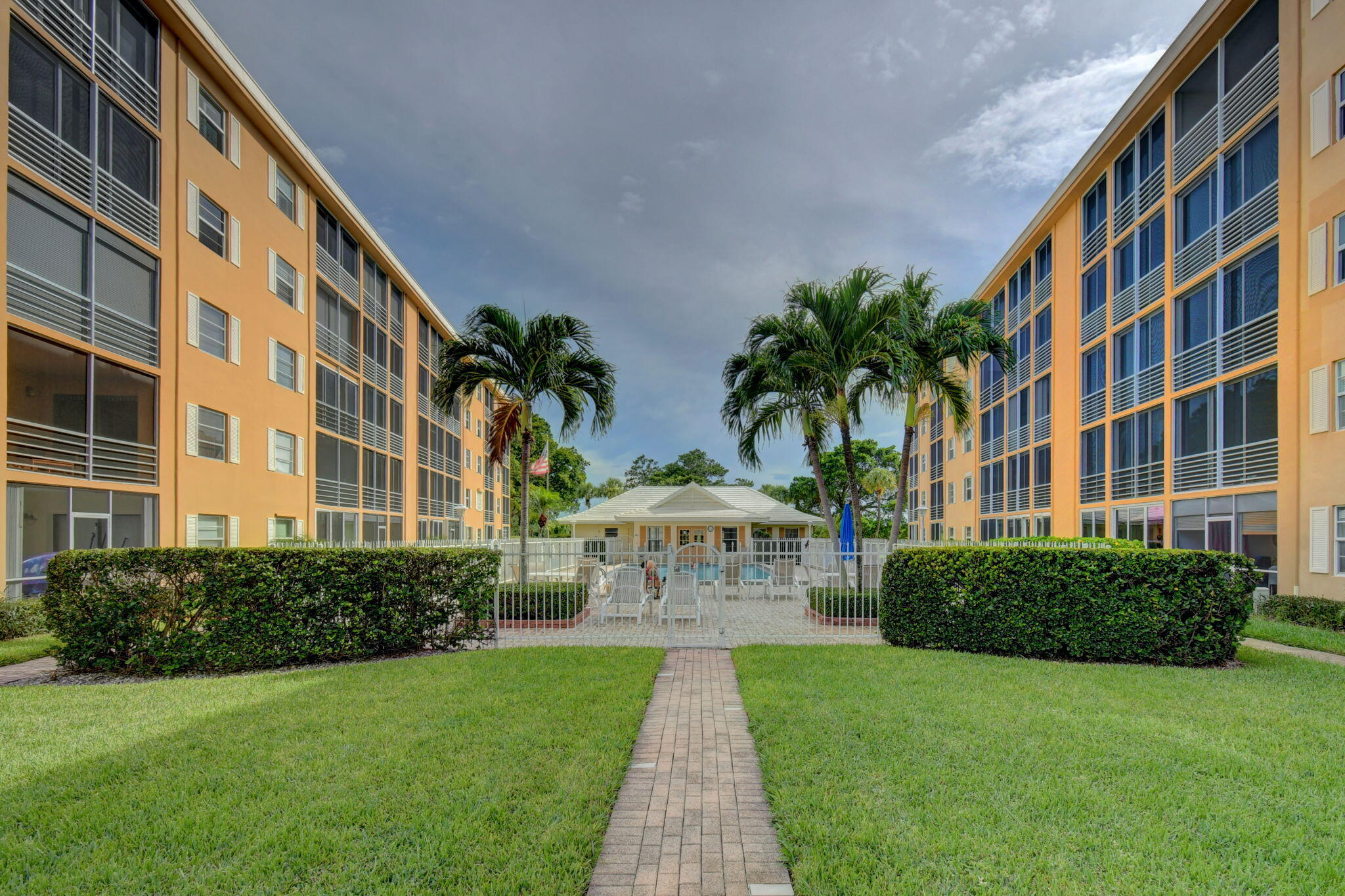 300 Golfview Road, Unit 407 North Palm Beach, FL 33408 - Photo 47 of 56 a view of building with garden