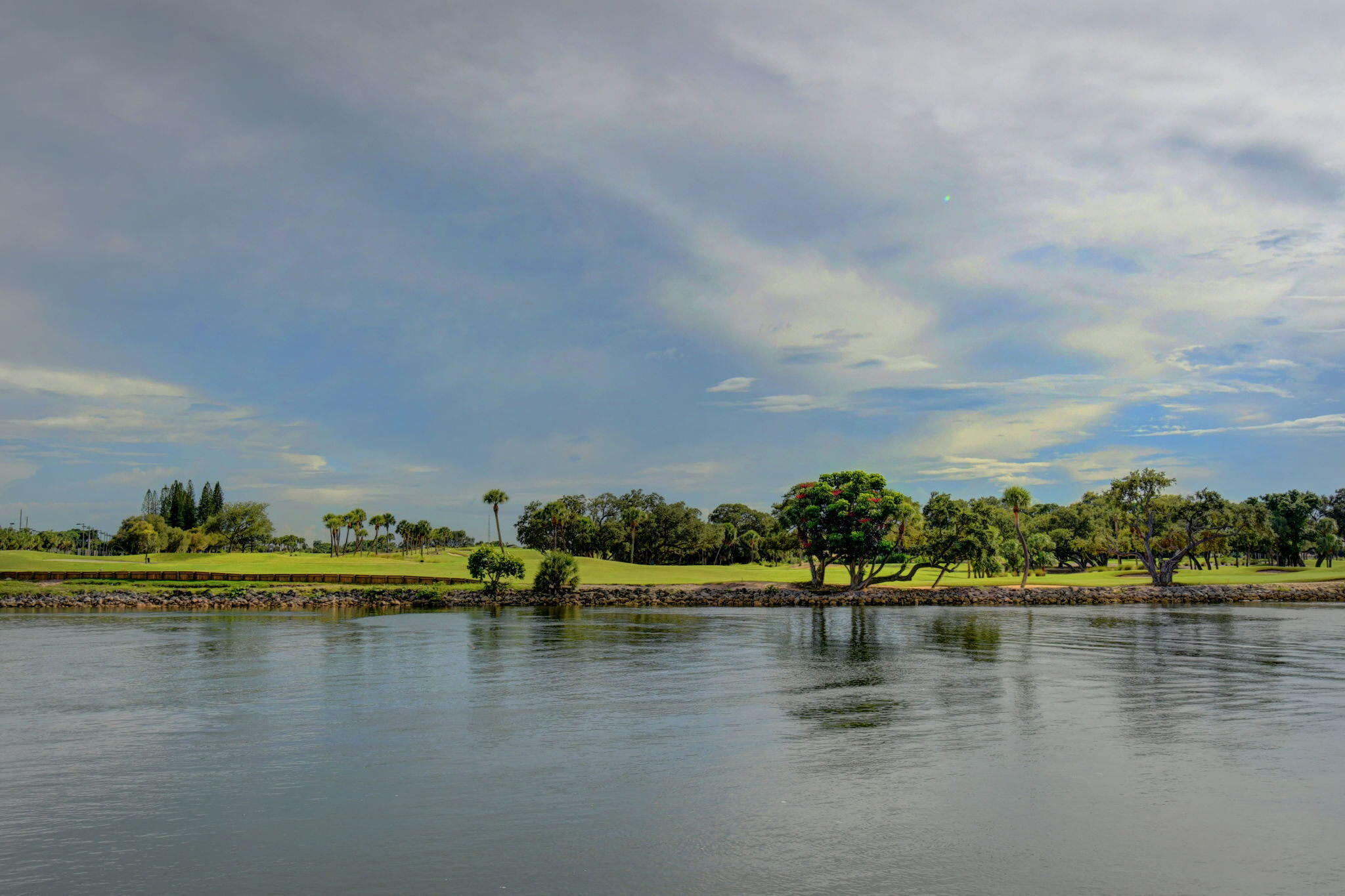 300 Golfview Road, Unit 407 North Palm Beach, FL 33408 - Photo 49 of 56 a view of a lake with houses in the back
