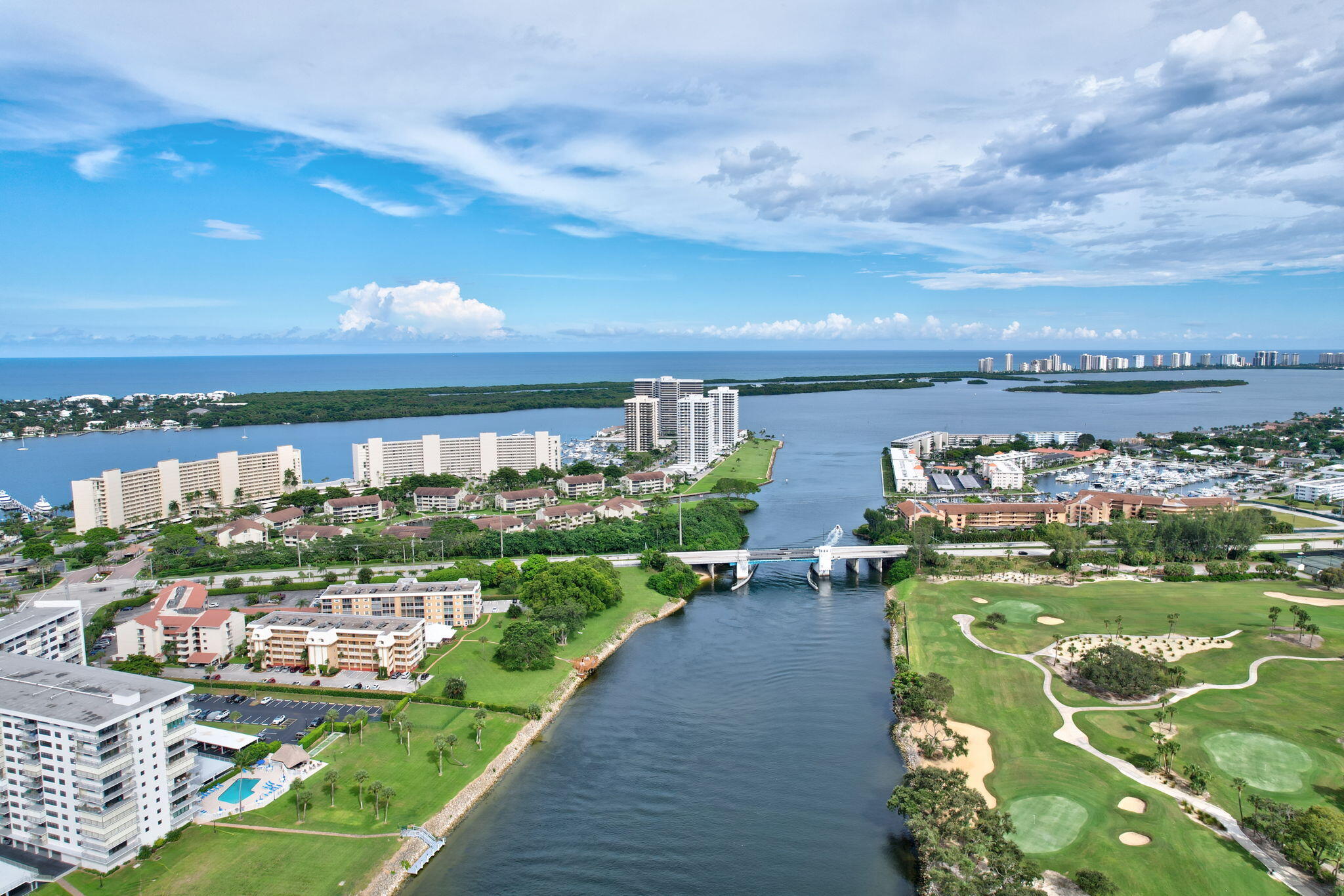 300 Golfview Road, Unit 407 North Palm Beach, FL 33408 - Photo 54 of 56 a view of a lake with a city