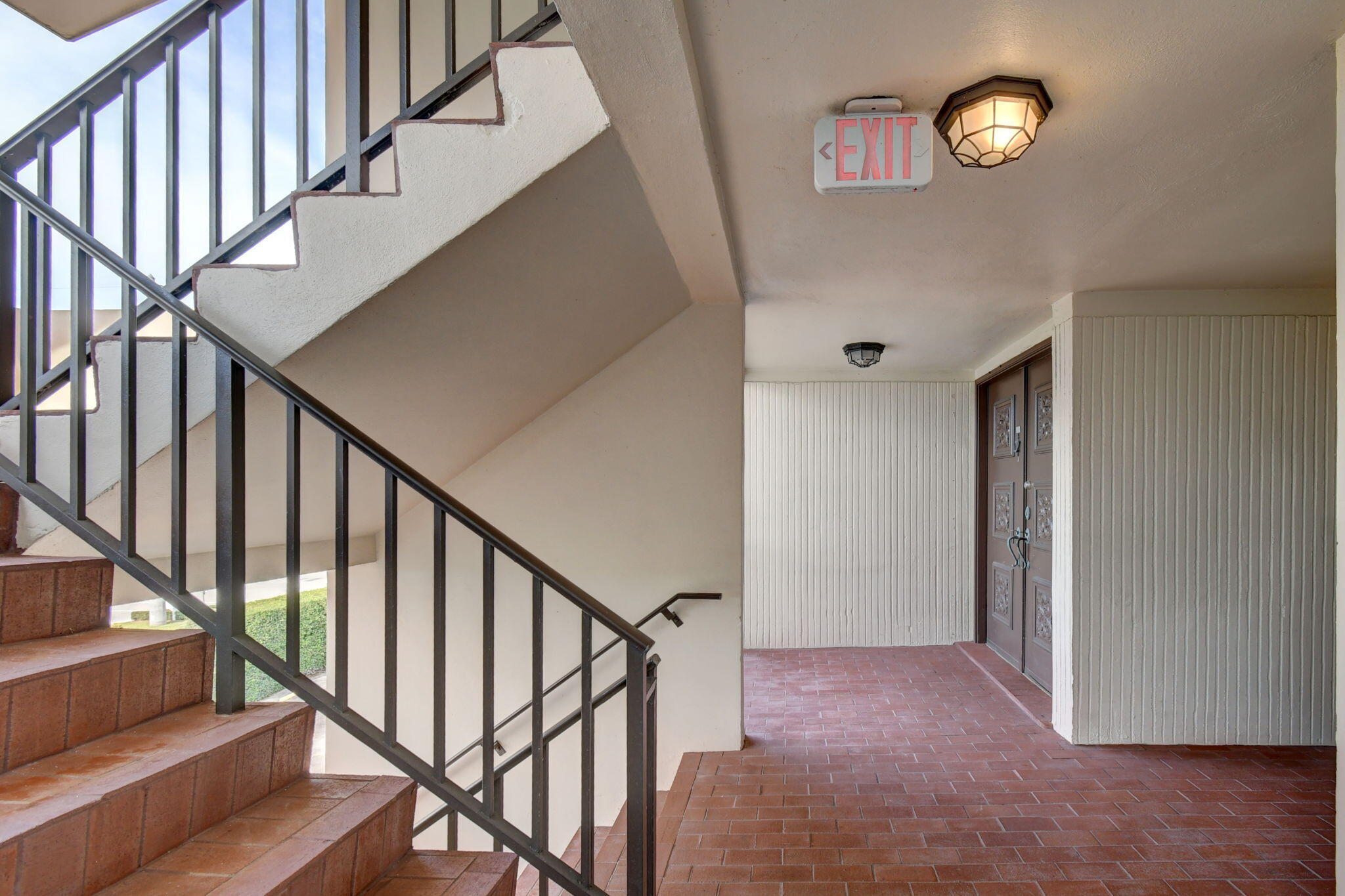 300 Golfview Road, Unit 407 North Palm Beach, FL 33408 - Photo 7 of 56 a view of an entryway with wooden floor