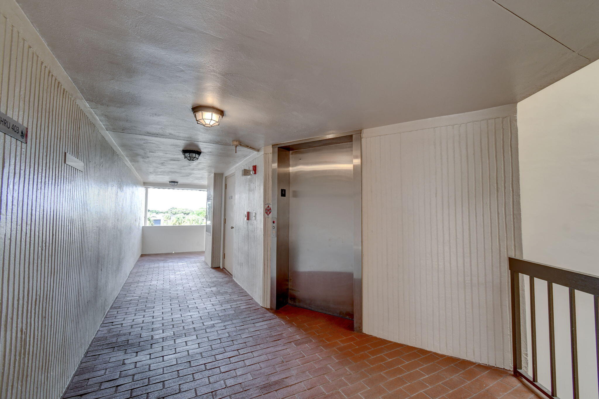 300 Golfview Road, Unit 407 North Palm Beach, FL 33408 - Photo 8 of 56 a view of hallway