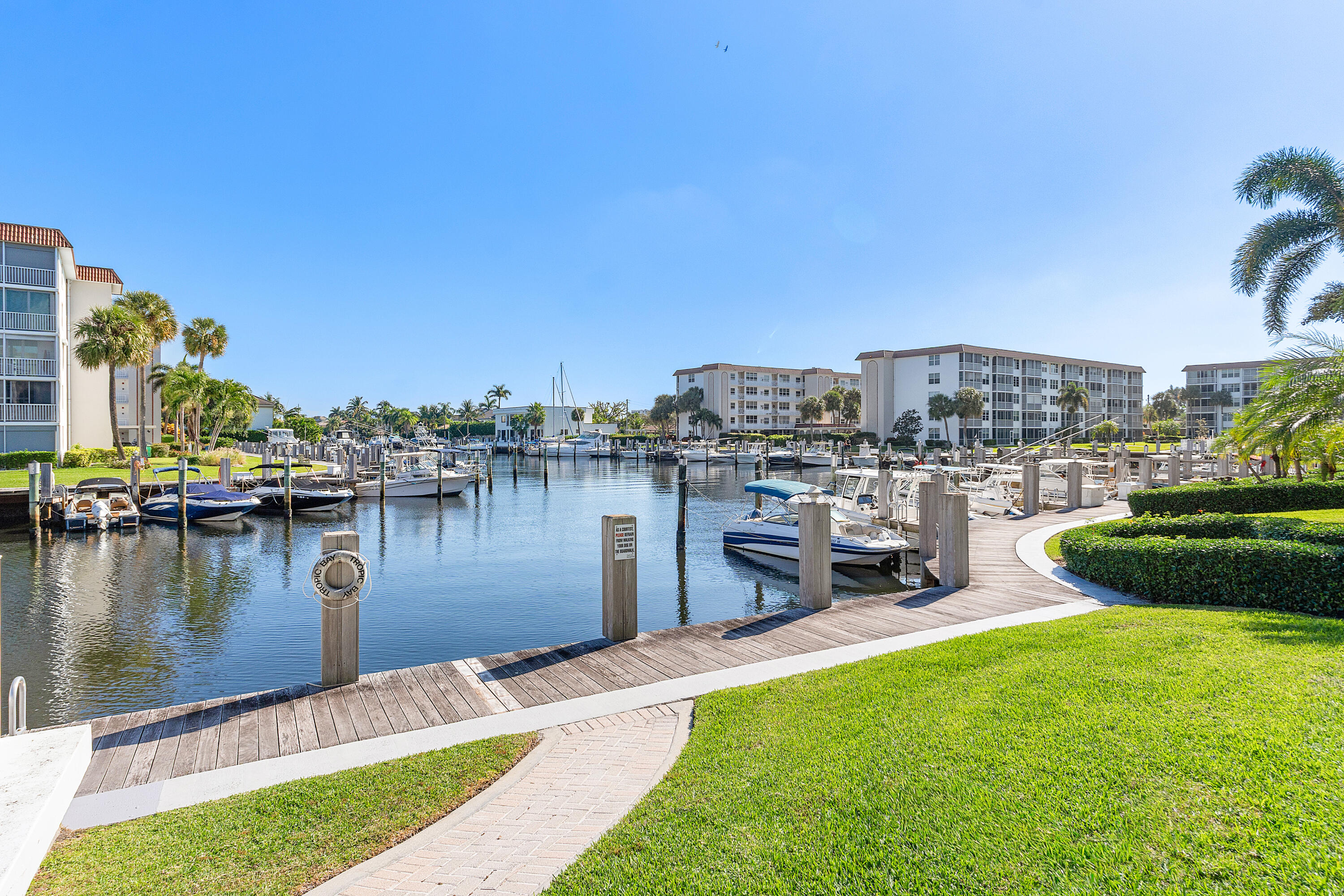 2525 Florida Boulevard, Unit 133 Delray Beach, FL 33483 - Photo 20 of 51 a view of a lake with houses