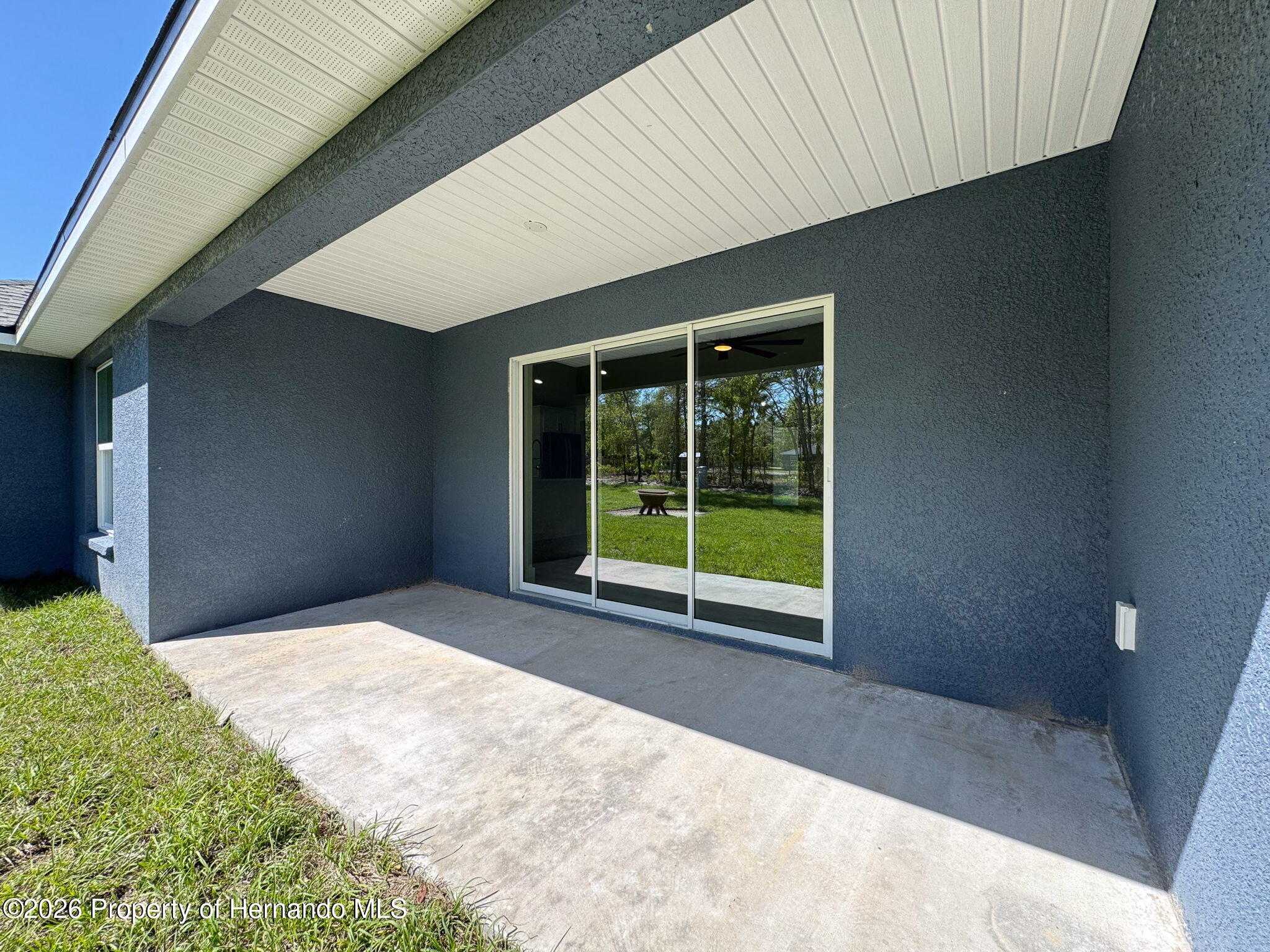 8988 Waterbird Way Weeki Wachee, FL 34613 - Photo 4 of 42 a view of an empty room with a window