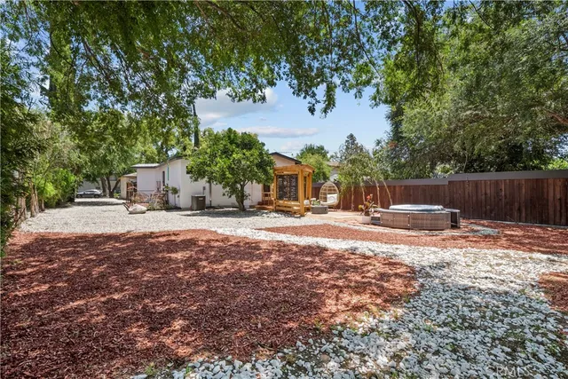 a view of back yard of the house
