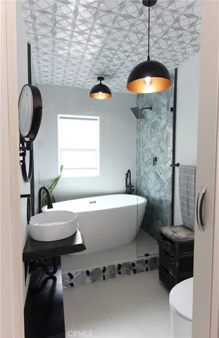 a bathroom with a sink and a toilet