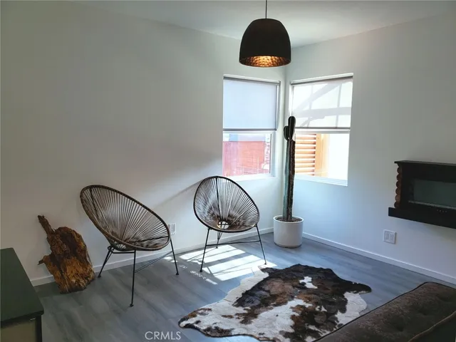 a workspace with furniture and a window