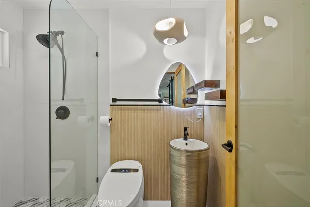 a bathroom with a sink and mirror