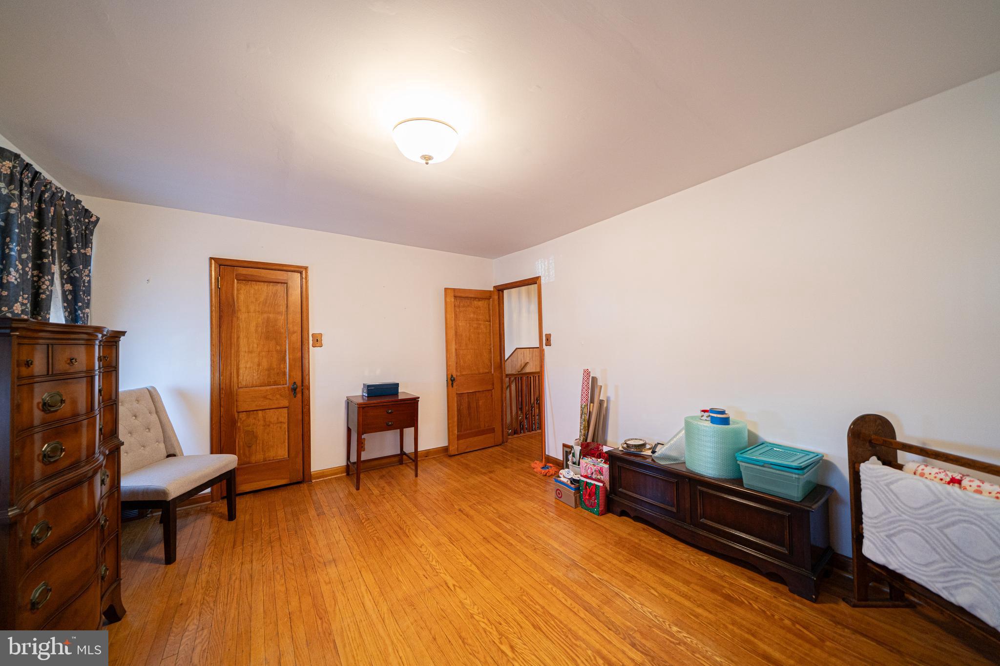 7409 Shisler Street Philadelphia, PA 19111 - Photo 14 of 27 a living room with furniture and a wooden floor