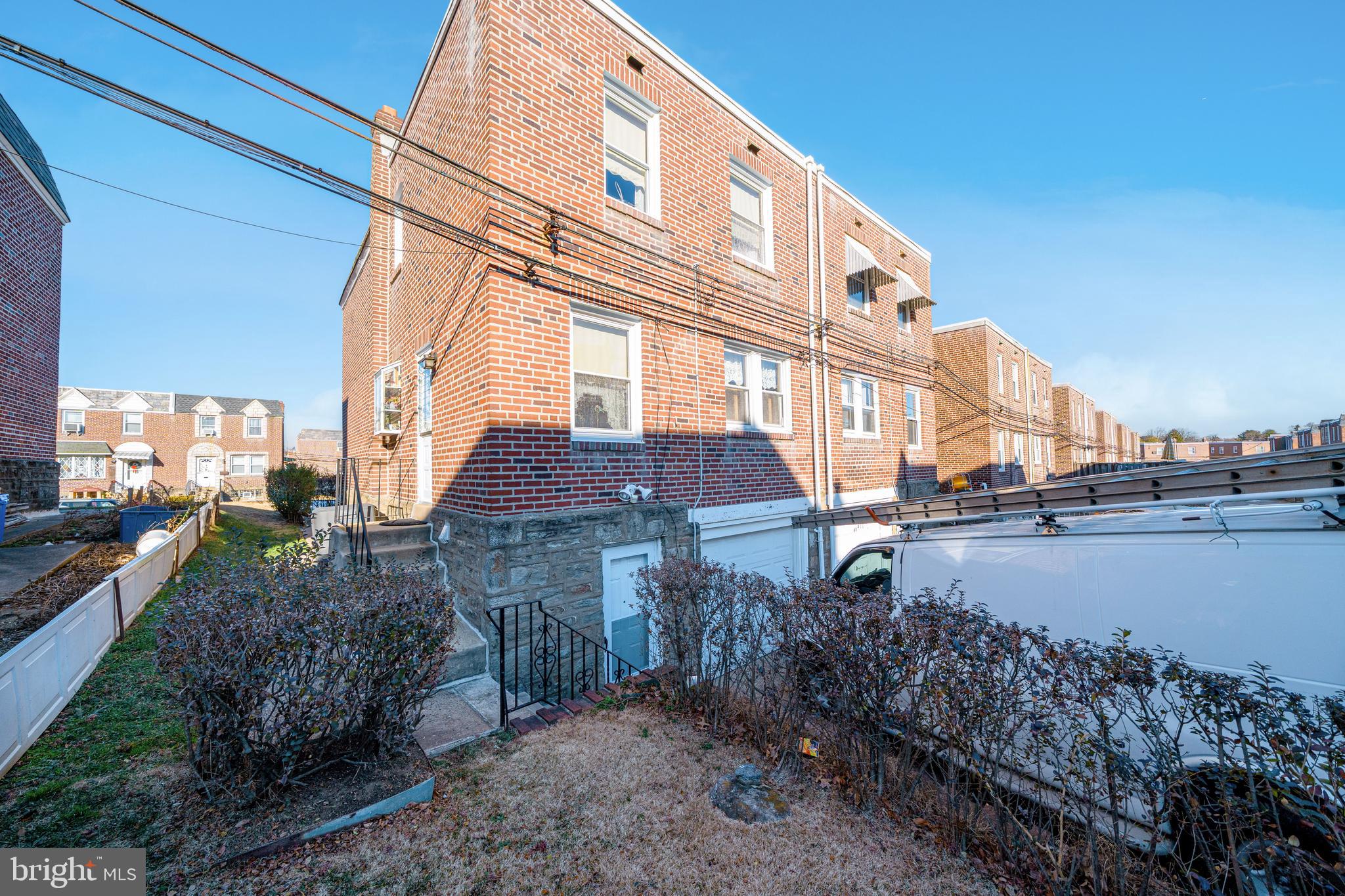 7409 Shisler Street Philadelphia, PA 19111 - Photo 24 of 27 a front view of a house with a garden