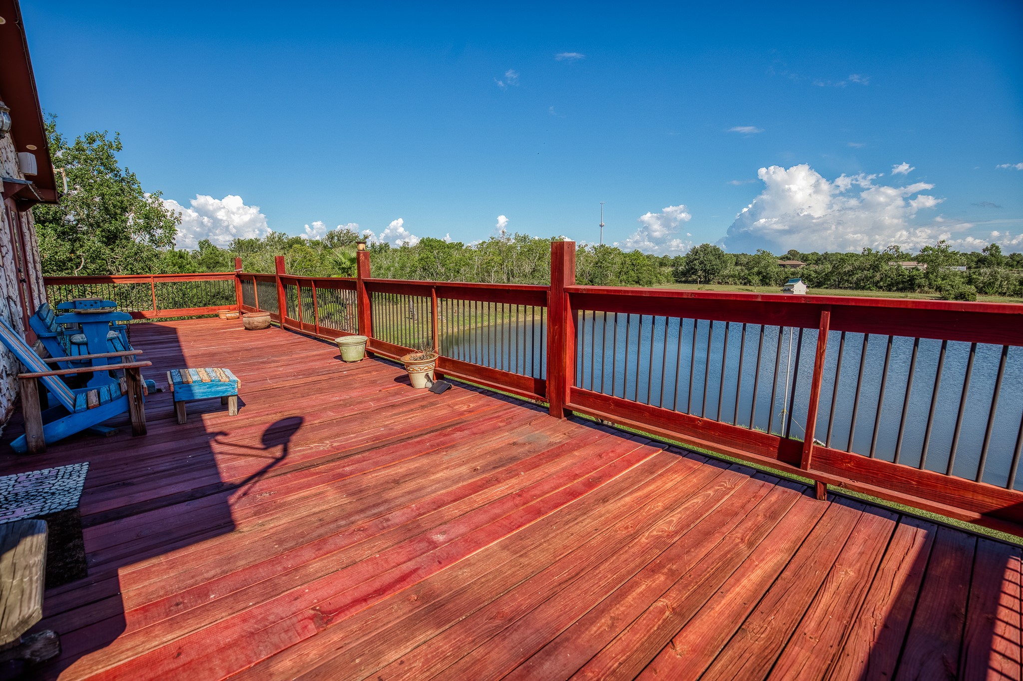 6510 Wig Street San Leon, TX 77539 - Photo 22 of 41 a balcony with chairs and wooden floor