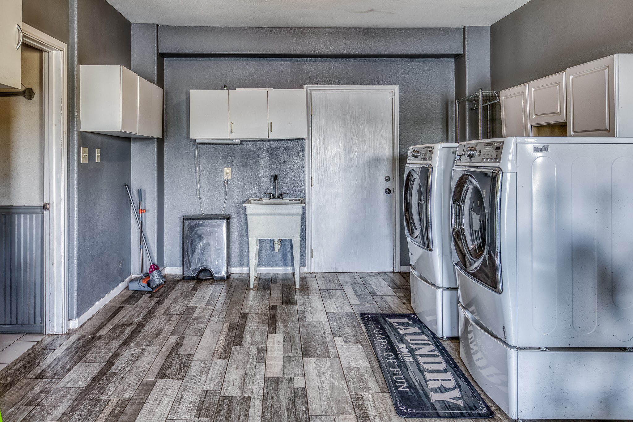 6510 Wig Street San Leon, TX 77539 - Photo 24 of 41 a view of kitchen with stainless steel appliances granite countertop a refrigerator and a stove top oven