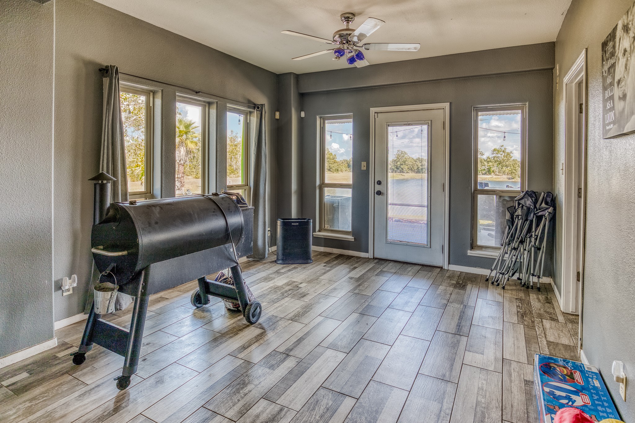 6510 Wig Street San Leon, TX 77539 - Photo 26 of 41 a view of a livingroom with hardwood floor and workspace