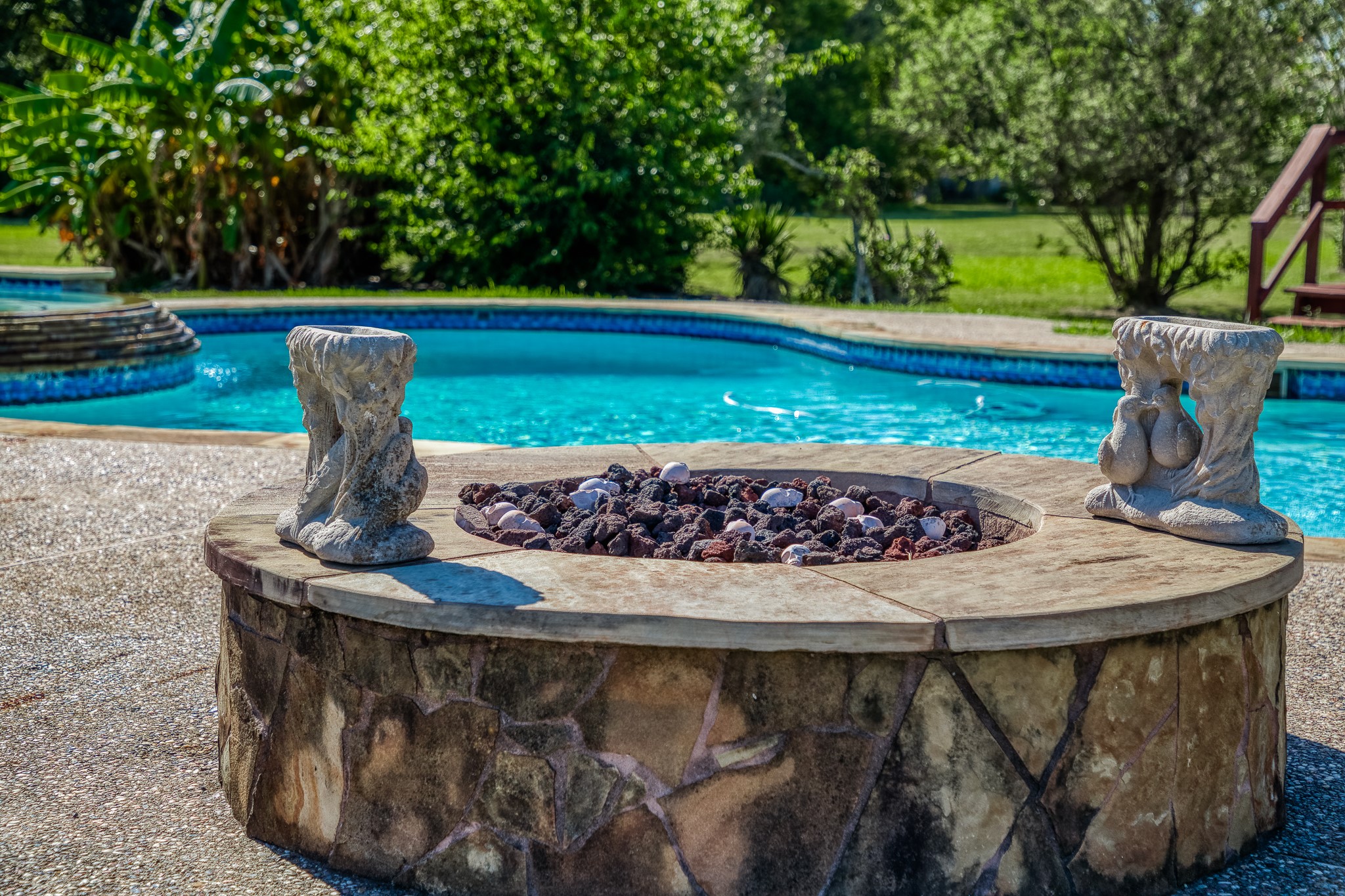 6510 Wig Street San Leon, TX 77539 - Photo 31 of 41 a view of a wooden floor and a fire pit