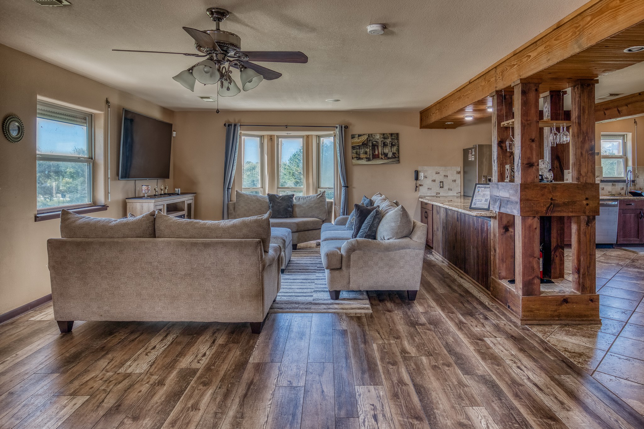 6510 Wig Street San Leon, TX 77539 - Photo 7 of 41 a living room with furniture and a wooden floor