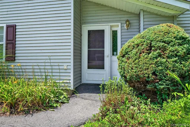 a plant that is in front of a house