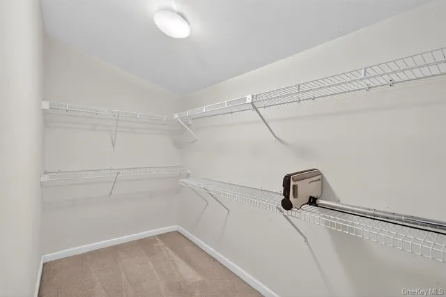 a view of a room with racks on the wall